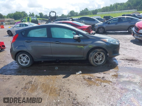 2019 Ford Fiesta SE z VIN 3FADP4EJ9KM125252, wystawiony jako IAAI lot #42221622 z przebiegiem 57 366 mil mil oraz . Historia ofert i sprzedaży dostępna na DreamBid. Obrazek 14.
