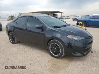 2019 Toyota Corolla L with VIN 5YFBURHEXKP947119, listed as a Copart auction lot 55101625 with 123,901 mi miles and Clean Title. Bid and sale history available at DreamBid. Image 4.