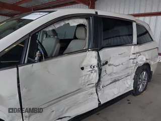2015 Honda Odyssey EX-L with VIN 5FNRL5H64FB084175, listed as a IAAI auction lot 41943540 with 67,902 mi miles and . Bid and sale history available at carsss.com. Image 6.
