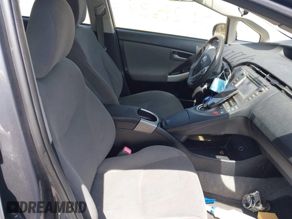 2012 Toyota Prius One z VIN JTDKN3DU6C1504544, wystawiony jako IAAI lot #42128634 z przebiegiem 298 344 mil mil oraz . Historia ofert i sprzedaży dostępna na DreamBid. Obrazek 5.