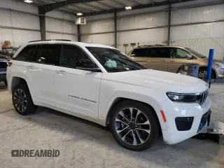 2022 Jeep Grand Cherokee Overland with VIN 1C4RJYD68N8716557, listed as a Copart auction lot 86807614 with 12,590 mi miles and Salvage title. Bid and sale history available at DreamBid. Image 4.