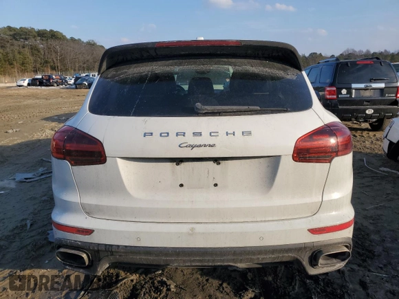 2016 Porsche Cayenne with VIN WP1AA2A29GKA13338, listed as a Copart auction lot 42319275 with 122,980 mi miles and Salvage Title. Bid and sale history available at carsss.com. Image 6.