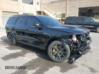 2024 Dodge Durango SRT 392 Premium with VIN 1C4SDJGJ7RC219017, listed as a IAAI auction lot 41610221 with 2,732 mi miles and . Bid and sale history available at DreamBid. Image 1.