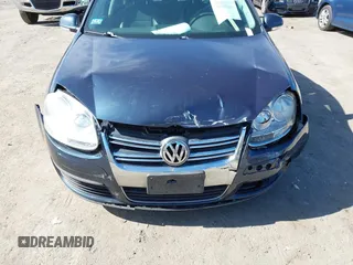 2009 Volkswagen Jetta SE with VIN 3VWRZ71K59M057372, listed as a IAAI auction lot 41741847 with 197,105 mi miles and . Bid and sale history available at DreamBid. Image 6.