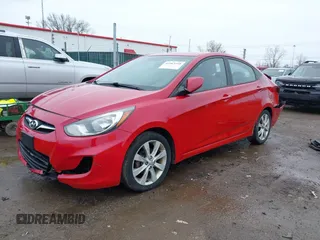 2012 Hyundai Accent GLS with VIN KMHCU4AEXCU168661, listed as a IAAI auction lot 41963258 with 216,006 mi miles. Bid and sale history available at carsss.com. Image 2.