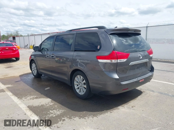 2011 Toyota Sienna XLE AAS with VIN 5TDYK3DC1BS069668, listed as a IAAI auction lot 42055430 with 212,167 mi miles and . Bid and sale history available at DreamBid. Image 3.