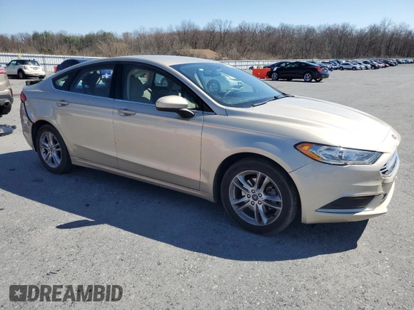 2018 Ford Fusion SE with VIN 3FA6P0HD4JR157390, listed as a Copart auction lot 50189075 with 115,410 mi miles and Salvage Title. Bid and sale history available at DreamBid. Image 4.