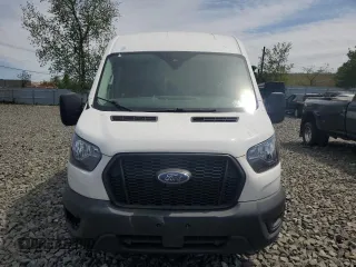 2021 Ford Transit Cargo с VIN 1FTBR1C81MKA80750, выставлен на аукционе Copart как лот 55567135 с пробегом 43 990 миль миль и Чистый • Clean title. История ставок и продаж доступна на DreamBid. Изображение 5.