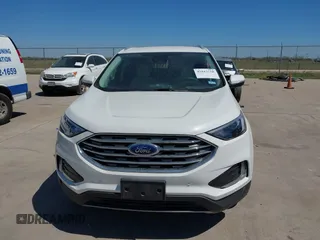 2024 Ford Edge Titanium z VIN 2FMPK4K98RBA75080, wystawiony jako IAAI lot #41843758 z przebiegiem 8687 mil mil oraz . Historia ofert i sprzedaży dostępna na DreamBid. Obrazek 6.