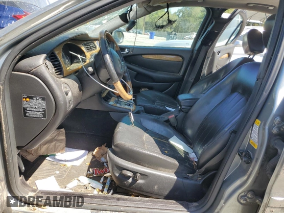 2004 Jaguar X-Type with VIN SAJEA51C04WD91344, listed as a Copart auction lot 49979285 with Not Provided miles and Salvage Title. Bid and sale history available at DreamBid. Image 7.
