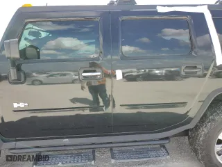 2003 Hummer H2 with VIN 5GRGN23U33H102570, listed as a Copart auction lot 77259654 with 0 mi miles and Salvage Title. Bid and sale history available at carsss.com. Image 13.