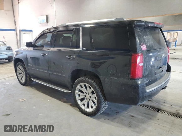 2015 Chevrolet Tahoe LTZ z VIN 1GNSKCKC9FR729198, wystawiony jako Copart lot #46727925 z przebiegiem 113 819 mil mil oraz Szkoda całkowita • Salvage title. Historia ofert i sprzedaży dostępna na DreamBid. Obrazek 2.