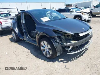 2024 Tesla Model Y with VIN 7SAYGDED2RF040745, listed as a IAAI auction lot 41986613 with 9,778 mi miles and . Bid and sale history available at DreamBid. Image 1.