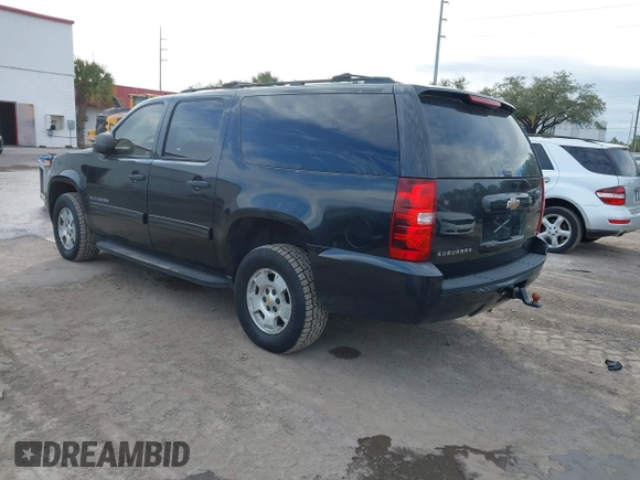 2010 Chevrolet Suburban LS with VIN 1GNUKHE38AR190423, listed as a IAAI auction lot 41655080 with 215,187 mi miles and . Bid and sale history available at DreamBid. Image 3.