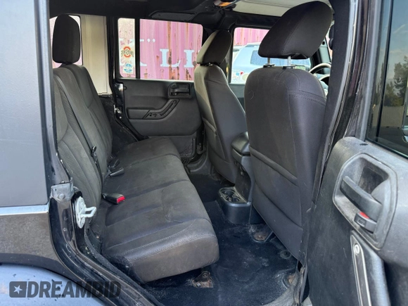 2015 Jeep Wrangler Unlimited Sport with VIN 1C4BJWDG8FL502570, listed as a Copart auction lot 65854505 with 120,541 mi miles and Clean title. Bid and sale history available at DreamBid. Image 6.
