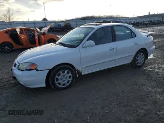 2000 Hyundai Elantra GLS z VIN KMHJF35F4YU038977, wystawiony jako Copart lot #80800144 z przebiegiem 97 373 mil mil oraz Czysty tytuł • Clean title. Historia ofert i sprzedaży dostępna na DreamBid. Obrazek 1.