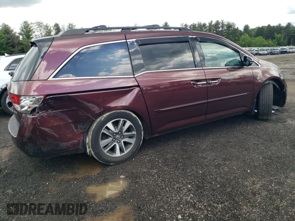 2015 Honda Odyssey Touring Elite with VIN 5FNRL5H98FB033336, listed as a Copart auction lot 57092355 with 186,046 mi miles and Salvage title. Bid and sale history available at DreamBid. Image 3.