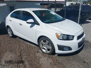 2016 Chevrolet Sonic LTZ z VIN 1G1JE5SB3G4142937, wystawiony jako IAAI lot #41903076 z przebiegiem 101 492 mil mil oraz . Historia ofert i sprzedaży dostępna na DreamBid. Obrazek 1.