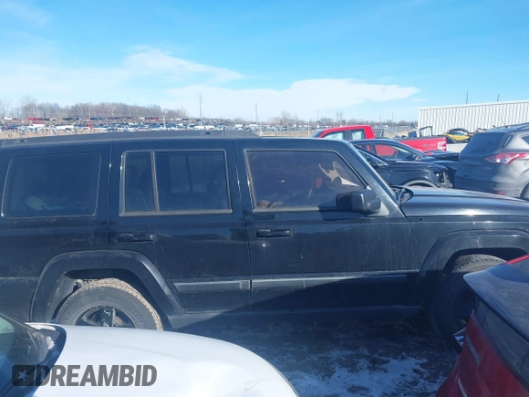 2007 Jeep Commander Sport z VIN 1J8HG48K37C647814, wystawiony jako IAAI lot #41428248 z przebiegiem 224 137 mil mil oraz . Historia ofert i sprzedaży dostępna na DreamBid. Obrazek 13.