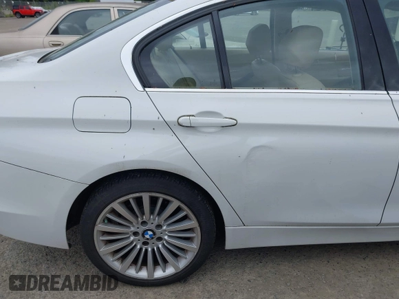 2012 BMW 3 Series 328i with VIN WBA3A5C56CF340427, listed as a IAAI auction lot 42246689 with 149,419 mi miles and . Bid and sale history available at DreamBid. Image 6.