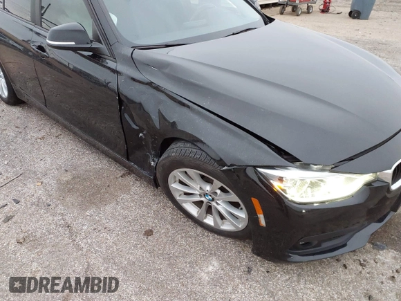2018 BMW 3 Series 320i with VIN WBA8E1G56JNU91008, listed as a IAAI auction lot 41247490 with 57,434 mi miles. Bid and sale history available at carsss.com. Image 6.