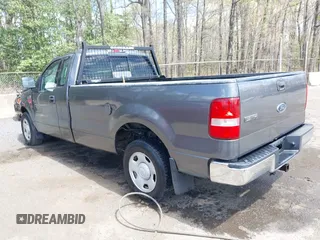 2004 Ford F-150 XL with VIN 1FTRF12W14NB89702, listed as a IAAI auction lot 42049938 with 106,379 mi miles. Bid and sale history available at carsss.com. Image 3.