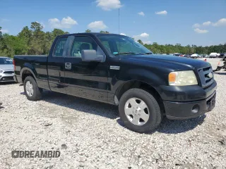 2007 Ford F-150 STX with VIN 1FTRX12W07FB12170, listed as a Copart auction lot 50452015 with 169,814 mi miles and Salvage title. Bid and sale history available at DreamBid. Image 4.