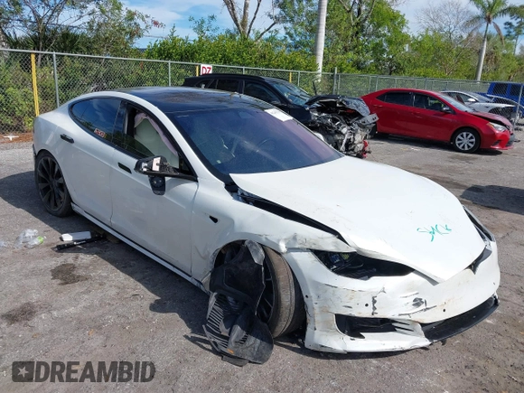 2020 Tesla Model S Long Range with VIN 5YJSA1E2XLF360260, listed as a IAAI auction lot 41241778 with 141,594 mi miles. Bid and sale history available at carsss.com. Image 1.