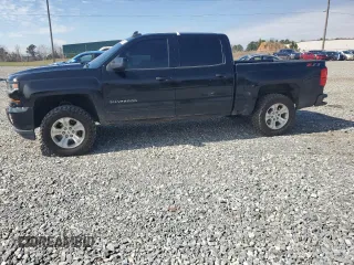 2018 Chevrolet Silverado 1500 LT with VIN 3GCUKREC3JG425552, listed as a Copart auction lot 46662535 with 122,469 mi miles and Salvage Title. Bid and sale history available at carsss.com. Image 1.