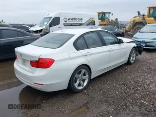 2014 BMW 3 Series 328i xDrive with VIN WBA3B5G50ENS06304, listed as a IAAI auction lot 41402704 with 139,943 mi miles. Bid and sale history available at carsss.com. Image 4.