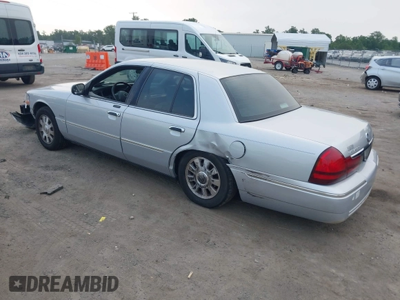 2003 Mercury Grand Marquis LS Premium z VIN 2MEFM75W03X658118, wystawiony jako IAAI lot #42435812 z przebiegiem 174 893 mil mil oraz . Historia ofert i sprzedaży dostępna na DreamBid. Obrazek 3.