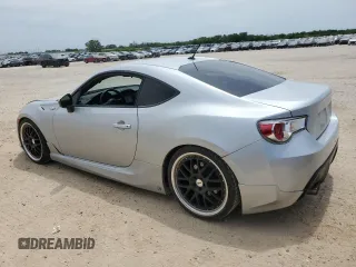 2013 Scion FR-S z VIN JF1ZNAA11D1704767, wystawiony jako Copart lot #52250275 z przebiegiem 82 246 mil mil oraz Czysty tytuł • Clean title. Historia ofert i sprzedaży dostępna na DreamBid. Obrazek 2.