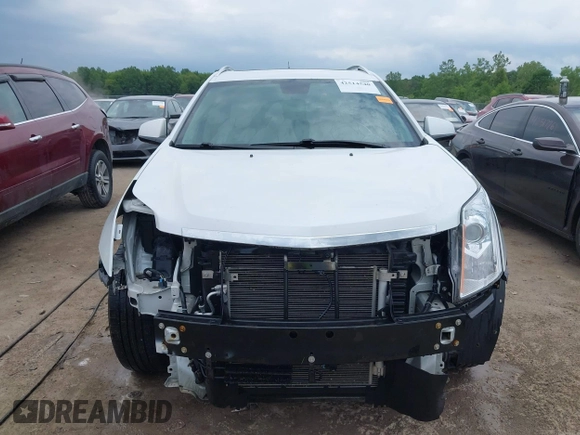 2012 Cadillac SRX Performance Collection with VIN 3GYFNEE32CS658275, listed as a IAAI auction lot 42514540 with 131,588 mi miles and . Bid and sale history available at DreamBid. Image 13.