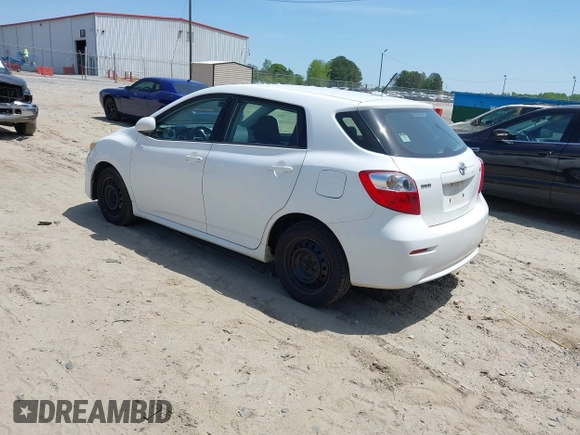 2009 Toyota Matrix with VIN 2T1KU40E39C091087, listed as a IAAI auction lot 42033558 with 338,496 mi miles. Bid and sale history available at carsss.com. Image 3.