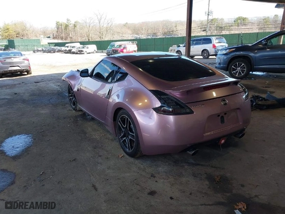 2014 Nissan 370Z with VIN JN1AZ4EH7EM631492, listed as a IAAI auction lot 41871006 with 68,354 mi miles. Bid and sale history available at carsss.com. Image 3.