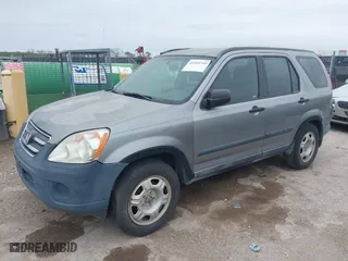 2006 Honda CR-V LX with VIN JHLRD68566C002862, listed as a IAAI auction lot 41954749 with 294,867 mi miles. Bid and sale history available at carsss.com. Image 2.
