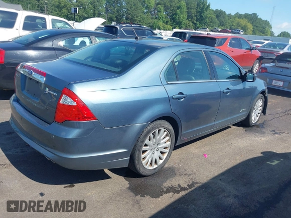 2011 Ford Fusion Hybrid with VIN 3FADP0L3XBR217504, listed as a IAAI auction lot 42633083 with 166,274 mi miles and . Bid and sale history available at DreamBid. Image 4.