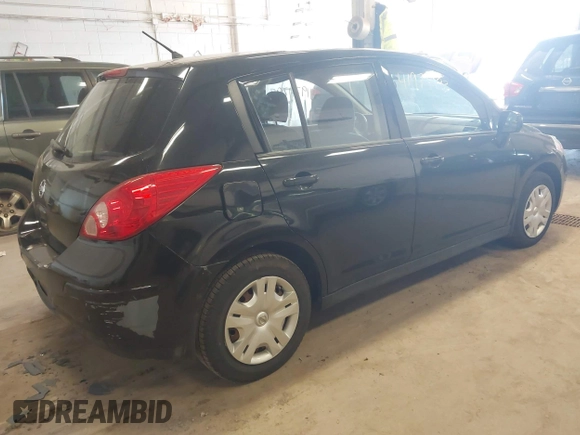 2012 Nissan Versa S with VIN 3N1BC1CP9CK248665, listed as a IAAI auction lot 41974293 with 146,465 mi miles. Bid and sale history available at carsss.com. Image 4.