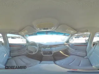 2001 Cadillac DeVille z VIN 1G6KD54Y61U227040, wystawiony jako Copart lot #46423295 z przebiegiem 180 289 mil mil oraz Szkoda całkowita • Salvage title. Historia ofert i sprzedaży dostępna na DreamBid. Obrazek 12.