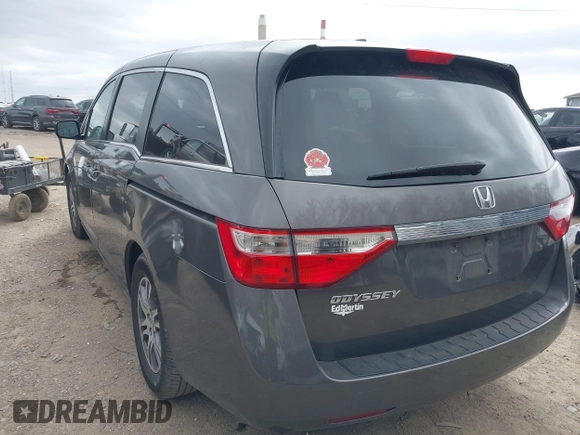 2012 Honda Odyssey EX-L with VIN 5FNRL5H60CB081866, listed as a IAAI auction lot 41835701 with 151,236 mi miles and . Bid and sale history available at DreamBid. Image 3.
