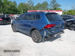 2019 Volkswagen Tiguan SE with VIN 3VV3B7AX2KM006055, listed as a IAAI auction lot 42023713 with 83,570 mi miles and . Bid and sale history available at DreamBid. Image 3.