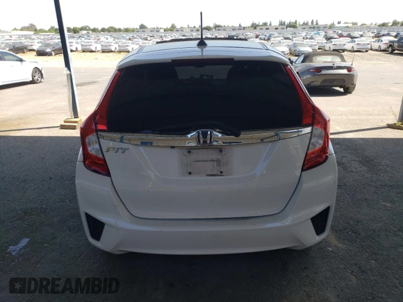 2015 Honda Fit EX-L с VIN 3HGGK5H86FM768802, выставлен на аукционе Copart как лот 58940725 с пробегом Не указан миль и Списание • Salvage title. История ставок и продаж доступна на DreamBid. Изображение 6.