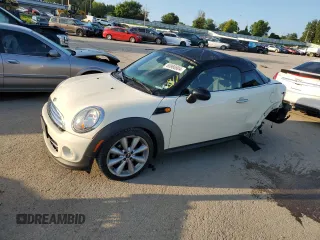 2014 MINI Cooper Coupe with VIN WMWSX1C5XET508092, listed as a Copart auction lot 65966804 with 113,790 mi miles and Salvage Title. Bid and sale history available at carsss.com. Image 1.