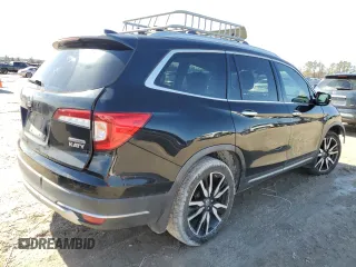 2019 Honda Pilot Touring 7-Passenger z VIN 5FNYF5H69KB019903, wystawiony jako Copart lot #43598805 z przebiegiem 144 486 mil mil oraz Szkoda całkowita • Salvage title. Historia ofert i sprzedaży dostępna na DreamBid. Obrazek 3.