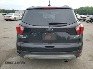 2019 Ford Escape Titanium with VIN 1FMCU0J95KUB14713, listed as a Copart auction lot 55887895 with 85,414 mi miles and Salvage title. Bid and sale history available at DreamBid. Image 6.