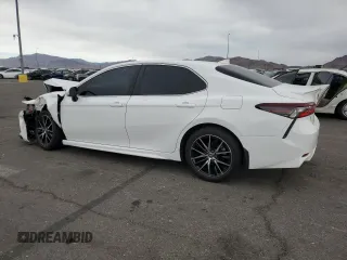 2024 Toyota Camry SE with VIN 4T1G11AK3RU844763, listed as a Copart auction lot 86654084 with 9,822 mi miles and Salvage Title. Bid and sale history available at carsss.com. Image 2.