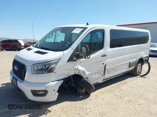 2023 Ford Transit Passenger XL with VIN 1FBAX2Y89PKA45043, listed as a IAAI auction lot 39253709 with 54,625 mi miles and . Bid and sale history available at DreamBid. Image 2.