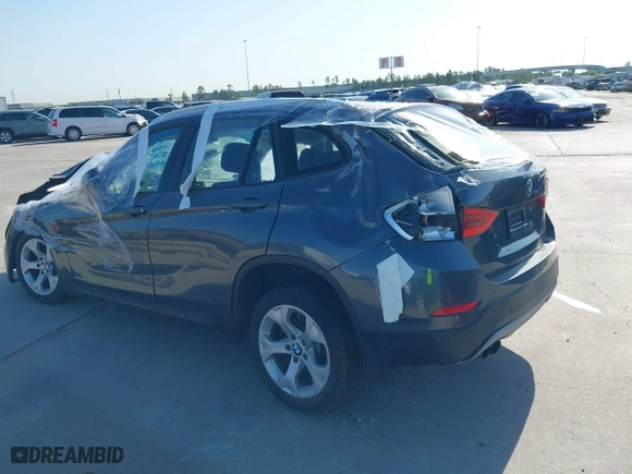 2014 BMW X1 sDrive28i with VIN WBAVM1C53EVW48026, listed as a IAAI auction lot 41714732 with 1 mi miles. Bid and sale history available at carsss.com. Image 3.