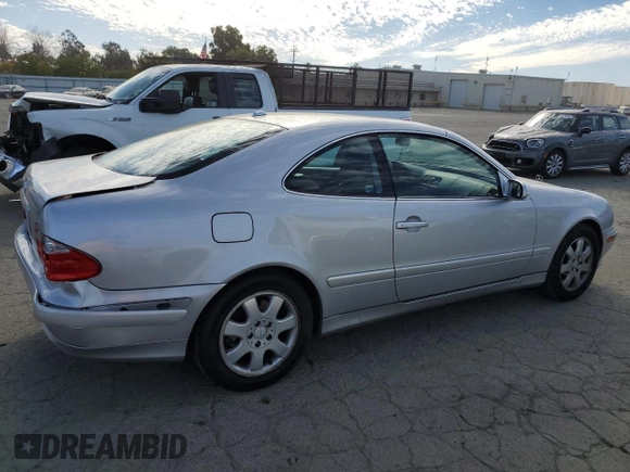 2000 Mercedes-Benz CLK 320/430 with VIN WDBLJ65G8YF122308, listed as a Copart auction lot 77449314 with 105,121 mi miles and Salvage Title. Bid and sale history available at DreamBid. Image 3.