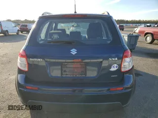 2011 Suzuki SX4 Crossover with VIN JS2YB5A37B6302152, listed as a Copart auction lot 82734944 with 132,014 mi miles and Clean Title. Bid and sale history available at carsss.com. Image 6.